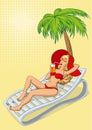 Beautiful young girl lying on beach in deck chair under palm tree Royalty Free Stock Photo