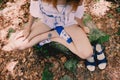 Beautiful young girl meditating doing yoga outdoors in summer forest near the stream Royalty Free Stock Photo