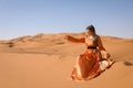 A girl in a beautiful Moroccan dress. Merzouga Morocco Royalty Free Stock Photo