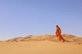 A girl in a beautiful Moroccan dress. Merzouga Morocco Royalty Free Stock Photo