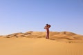 A girl in a beautiful Moroccan dress. Merzouga Morocco Royalty Free Stock Photo