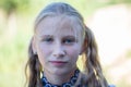 Beautiful young girl outdoors, portrait children close up Royalty Free Stock Photo