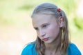 Beautiful young girl outdoors, portrait children close up Royalty Free Stock Photo