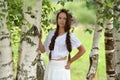 Beautiful young girl with plaits and daisies Royalty Free Stock Photo