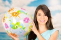 Beautiful young girl playing with beach ball Royalty Free Stock Photo