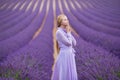 Beautiful young girl in provence lavender field background in valensole