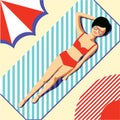 Beautiful young girl in a red swimsuit and glasses, sunbathing on the beach on a rug with blue stripes under an umbrella. Retro st