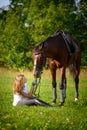 Beautiful young girl rider and her horse Royalty Free Stock Photo