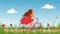 Beautiful young girl riding bike on spring flowering field. Royalty Free Stock Photo