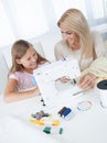 Beautiful Young Girl Sewing With Her Mother Royalty Free Stock Photo
