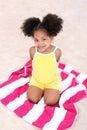 Beautiful Young Girl Sitting On Beach Towel In The Sand Royalty Free Stock Photo