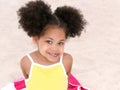 Beautiful Young Girl Sitting On Beach Towel In The Sand Royalty Free Stock Photo