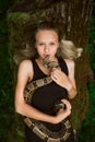 Beautiful young girl with snake