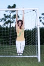 Beautiful young girl at soccer field