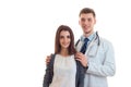 Beautiful young girl standing next to a doctor and smiling Royalty Free Stock Photo