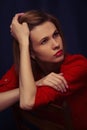 Beautiful young girl stands on a black background Royalty Free Stock Photo