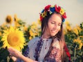 Beautiful young girl at sunflower field Royalty Free Stock Photo