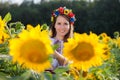 Beautiful young girl at sunflower field Royalty Free Stock Photo