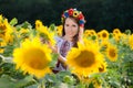 Beautiful young girl at sunflower field Royalty Free Stock Photo