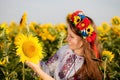 Beautiful young girl at sunflower field Royalty Free Stock Photo