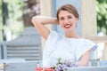 Beautiful young girl at table