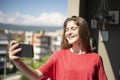 Beautiful Young Girl Taking Selfie with her Mobile Phone Royalty Free Stock Photo