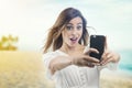 Beautiful young girl taking a selfie Royalty Free Stock Photo