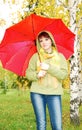 Beautiful young girl and umbrella.