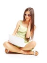 Beautiful young girl using a laptop Royalty Free Stock Photo