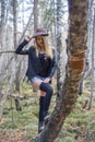 Beautiful young girl walking in the autumn forest. Royalty Free Stock Photo