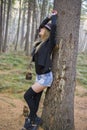 Beautiful young girl walking in the autumn forest. Royalty Free Stock Photo