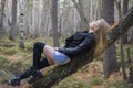 Beautiful young girl walking in the autumn forest. Royalty Free Stock Photo