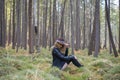 Beautiful young girl walking in the autumn forest. Royalty Free Stock Photo