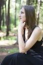 Beautiful young girl walking in a fairy forest. Royalty Free Stock Photo