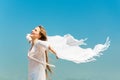 Beautiful young girl with white scarf