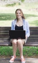 Beautiful young girl working on a laptop Royalty Free Stock Photo