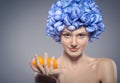 Beautiful young girl with yellow tangerines