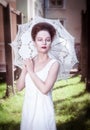 Beautiful young gothic woman in white shirt with umbrella Royalty Free Stock Photo