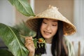 Beautiful young and happy asian woman eating healthy salad with fresh organic vegetables Royalty Free Stock Photo