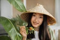 Beautiful young and happy asian woman eating healthy salad with fresh organic vegetables Royalty Free Stock Photo