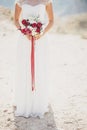 Beautiful young happy bride standing on the top of the mountain Royalty Free Stock Photo