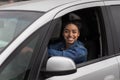 Beautiful young happy smiling woman driving new car or auto blogger shoots new video Royalty Free Stock Photo