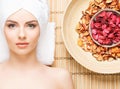 Beautiful, young and healthy woman in spa salon on bamboo mat. S Royalty Free Stock Photo