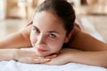 Beautiful, young and healthy woman in spa salon. Spa, health and healing concept. Massage treatment