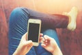 Beautiful young hipster woman using smart phone in coffee shop, Royalty Free Stock Photo