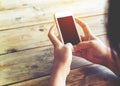 Beautiful young hipster woman using smart phone in coffee shop, Royalty Free Stock Photo