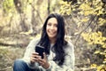 Beautiful Young Hispanic, American Indian, Multi-racial Woman with Cell Phone