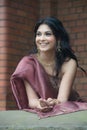 Beautiful young Indian woman wearing traditional dress