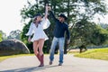 A Beautiful Young Interracial Couple Pose For Their Engagement Photographs Outdoors Royalty Free Stock Photo