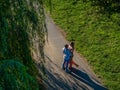 A Beautiful Young Interracial Couple Pose For Their Engagement Photographs Outdoors Royalty Free Stock Photo